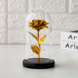 Златна роза в стъкленица